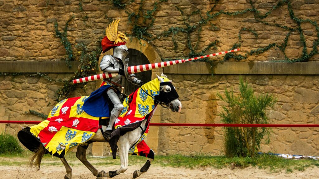 Knight on horseback riding the lists in a reenactment tourney