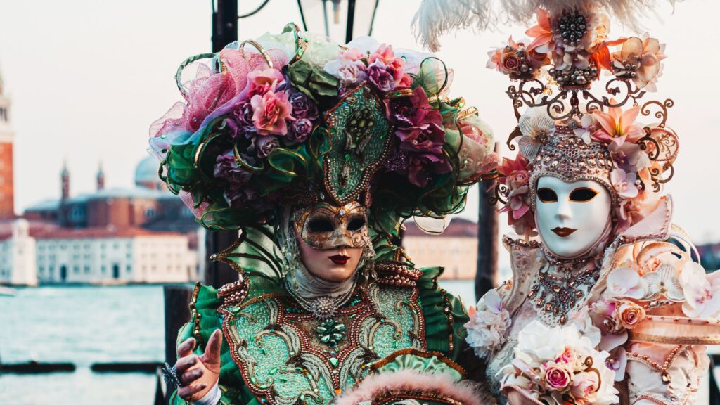 2 people in Venetian costumes